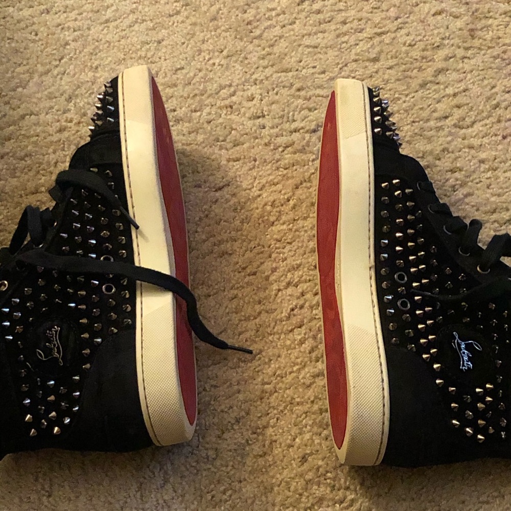 Red Bottoms, black and silver spikes.